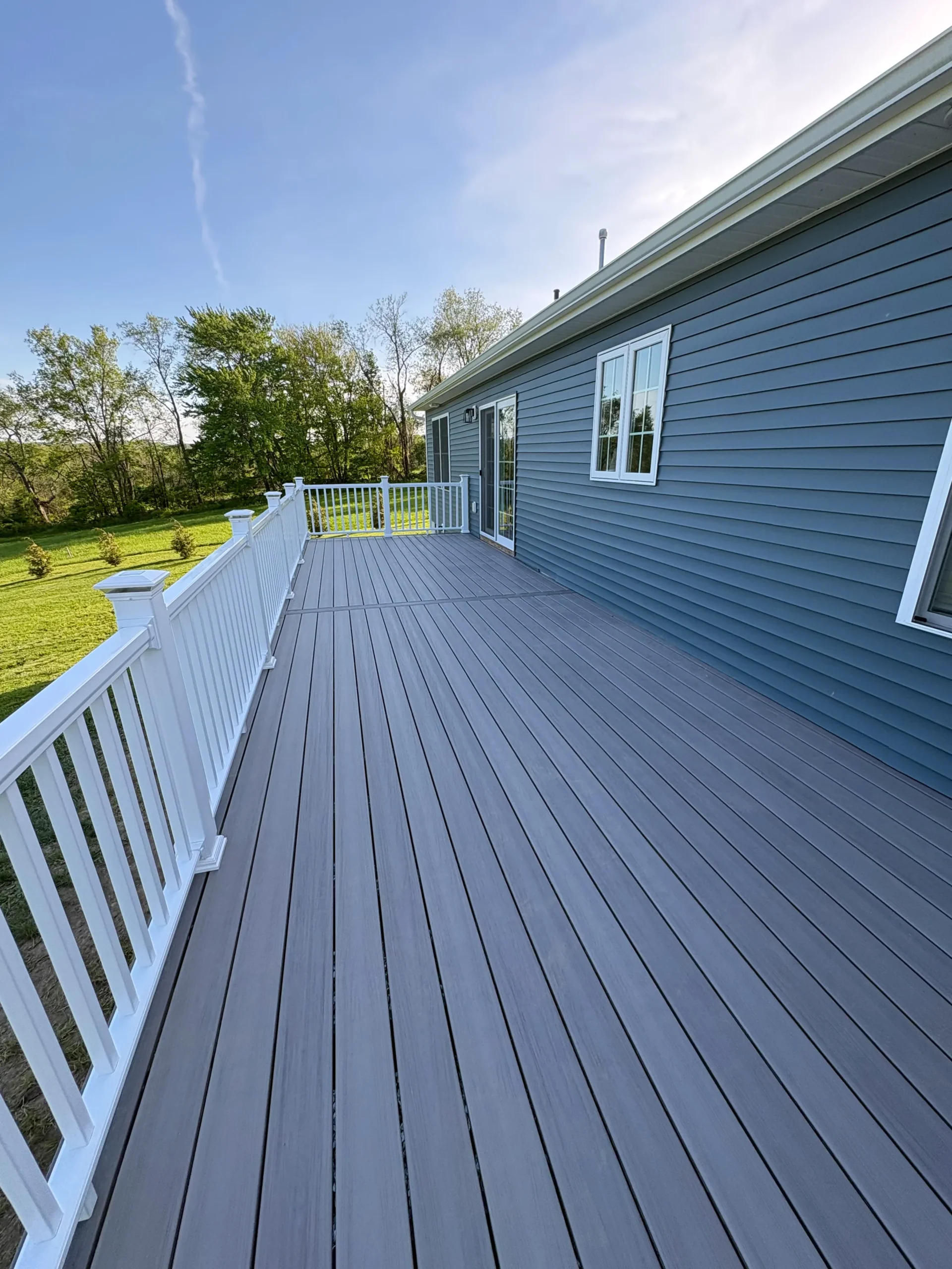 Deck removal experts clearing a backyard in Orange County, NY